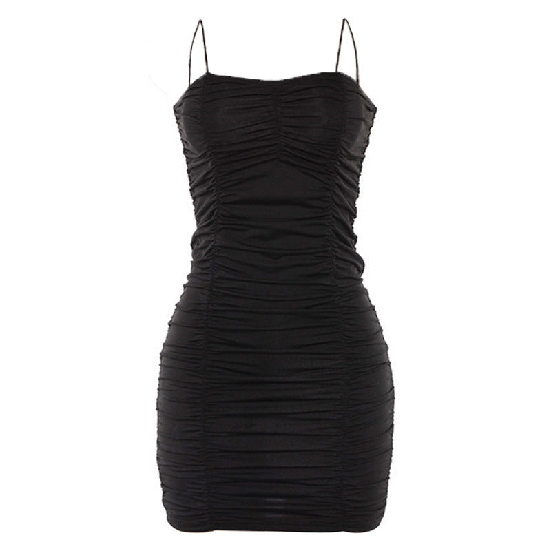 Black ruched dress on a white background